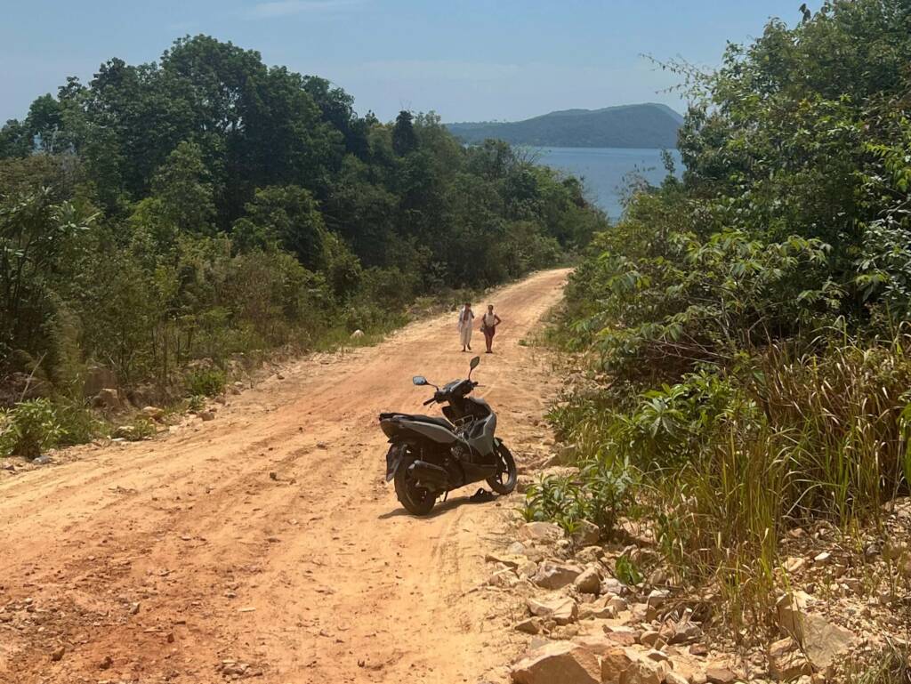Rental Scooter on dusty road in Cambodia
