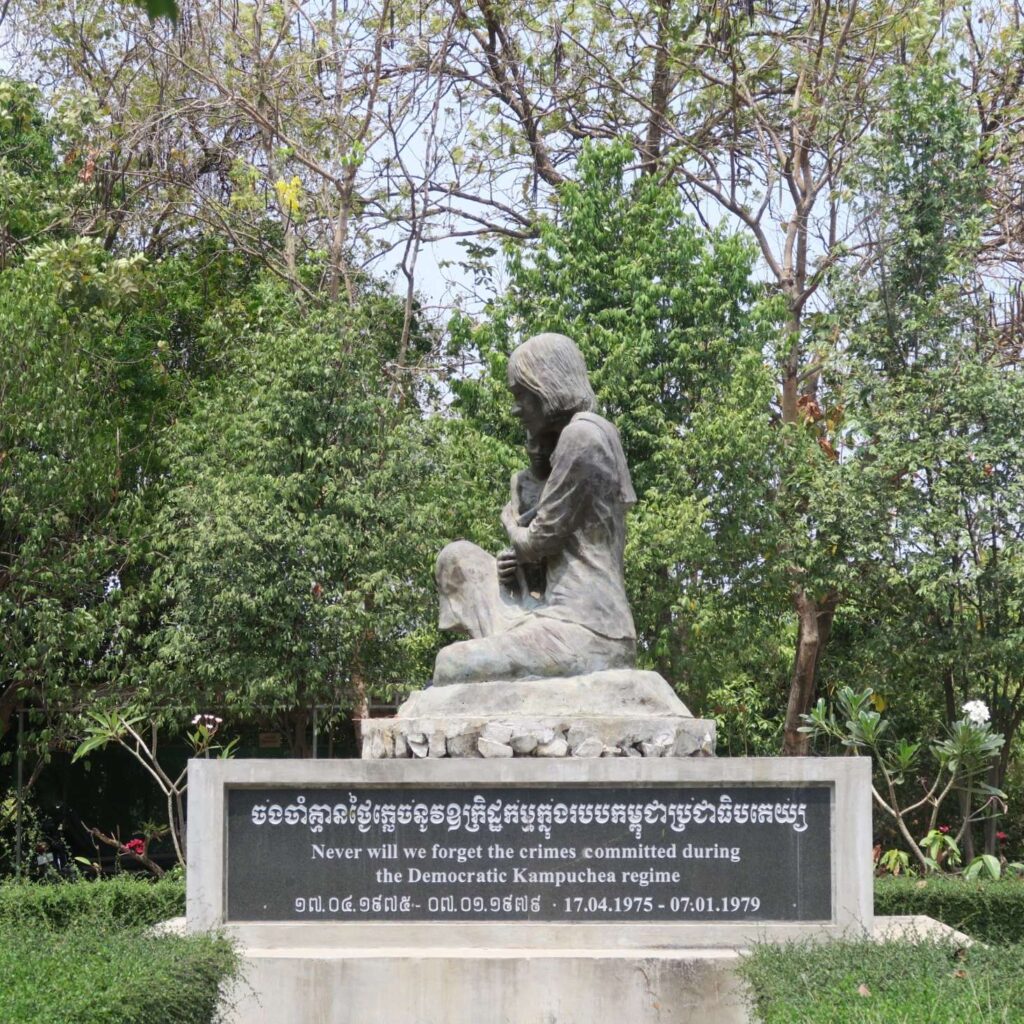 A statue memorial to the victims of the Cambodian Genocide in the killing field.