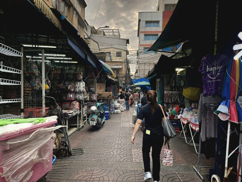 Bangkok street scene at sunset with street markets and locals