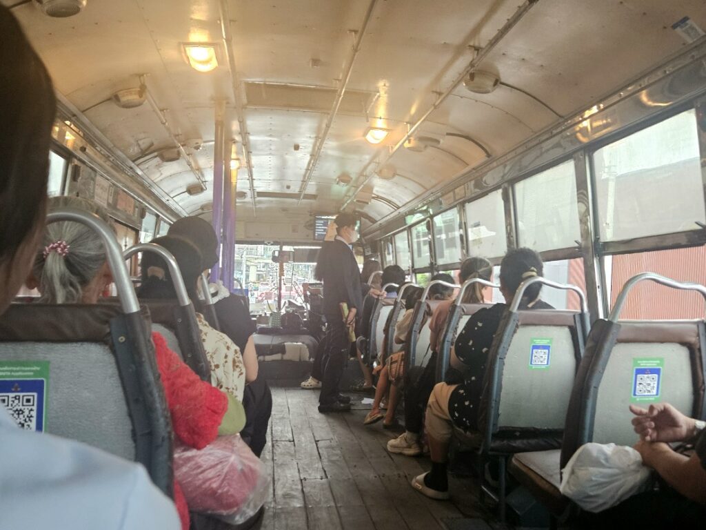 Interior of a crowded bus Bangkok public transport 